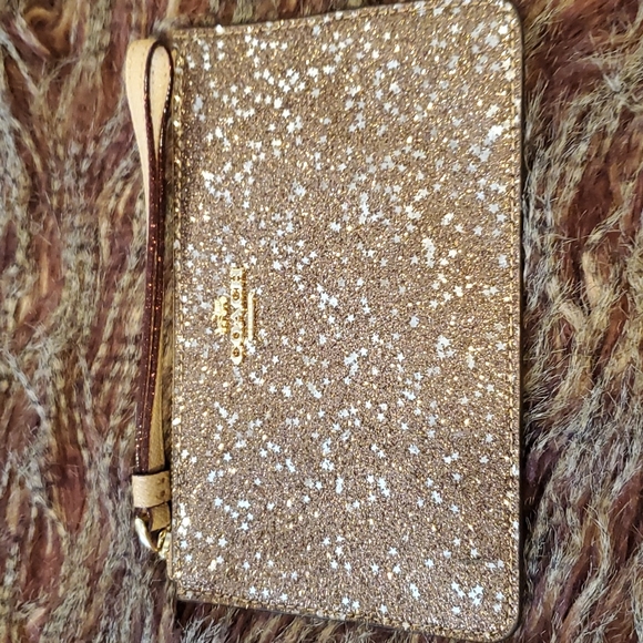 Coach Handbags - COACH  Gold Star Glitter Wristlet